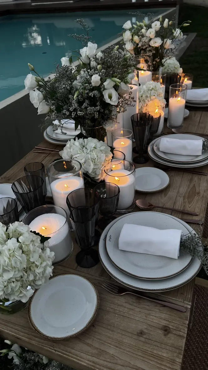 Refined tablescape with white florals and candlelight